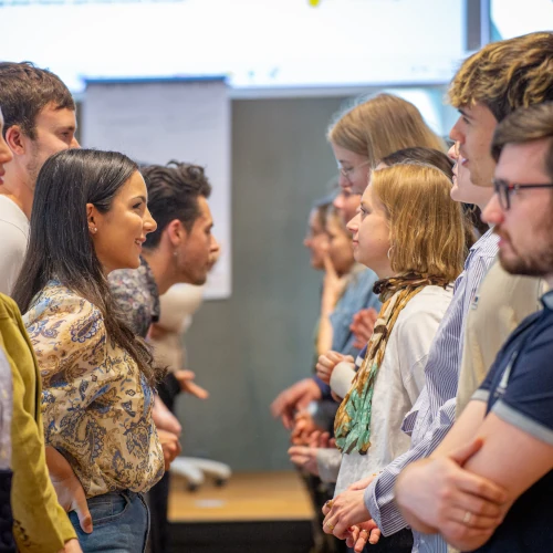 Workshop participants talking in pairs